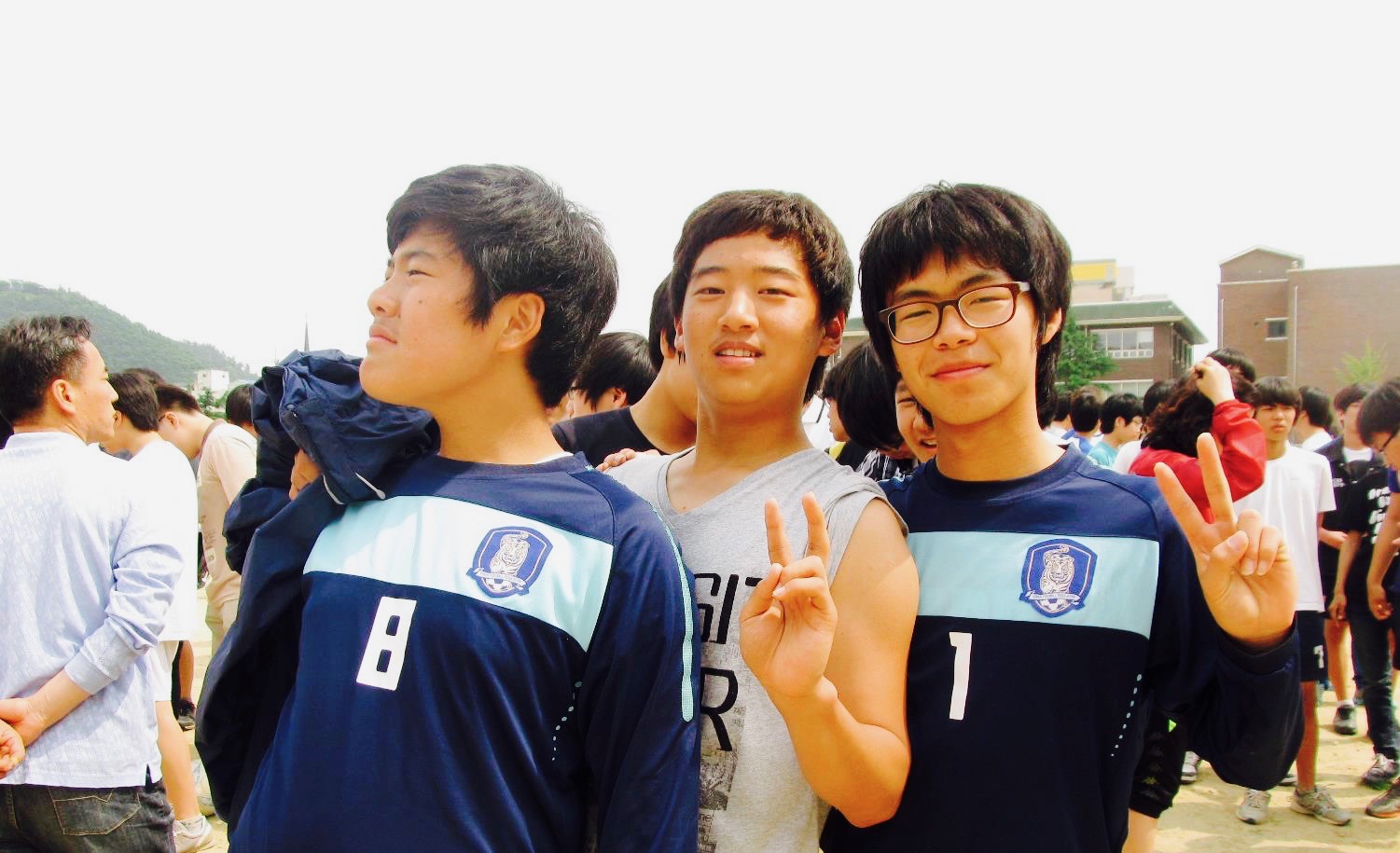 first-year high school boys taking a break from Sports Day activities
